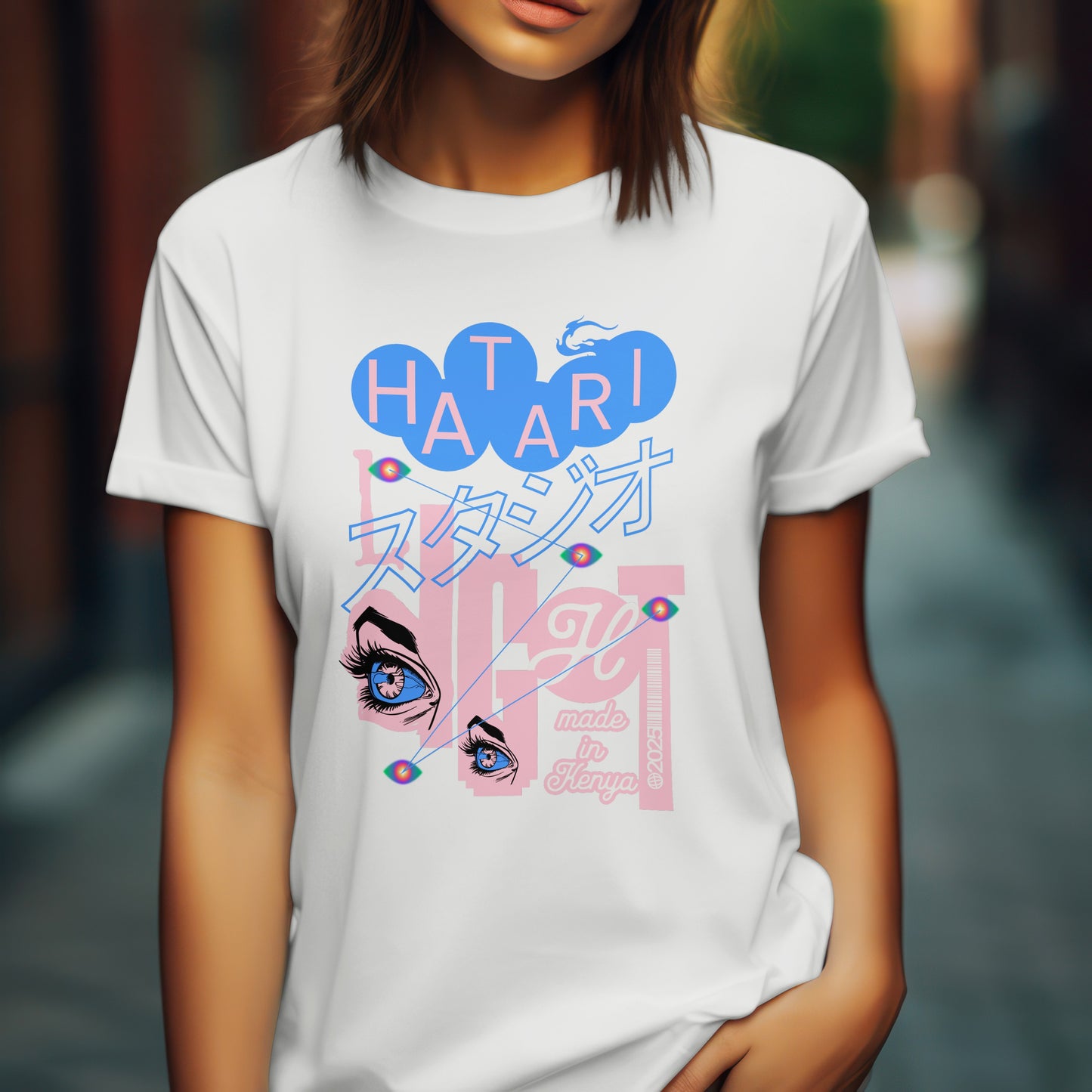 Person wearing a white t-shirt with colorful graphics and text.